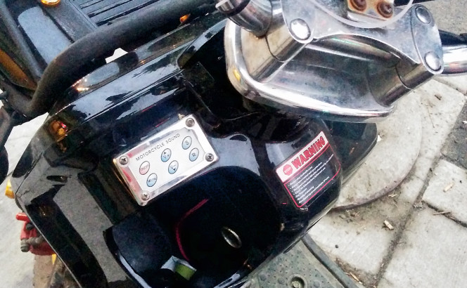 “Motorcycle Sounds” sound-effects pad on a garden-variety “e-bike” [Idlewild]